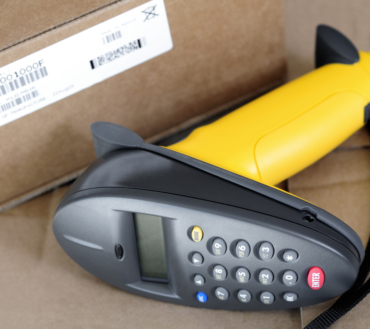 ERP-Systeme Bild Paket und Barcode Scanner